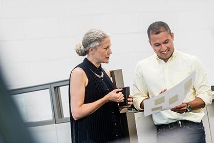 UBC colleagues engaged in conversation