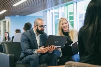 HR staff looking at a smartphone