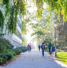 students walking in the sun